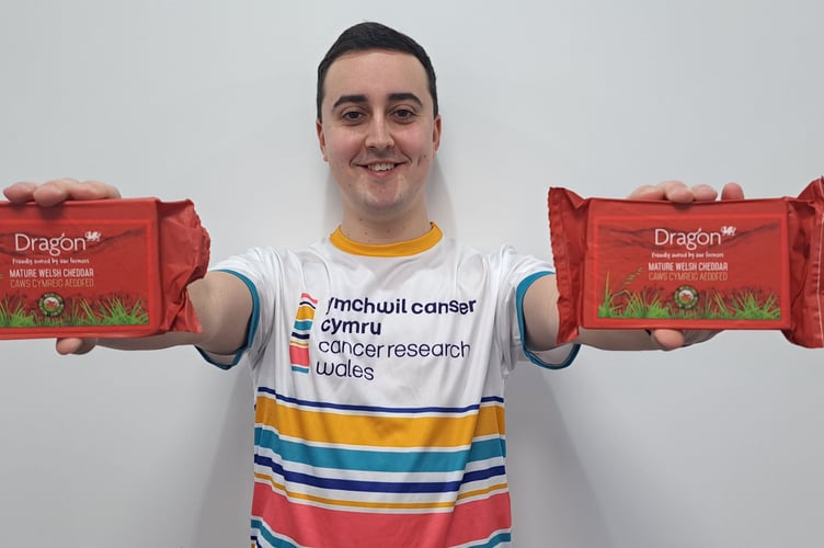 Dr Peter Henley, Cancer Research Wales’s Research Development Officer, with SCC’s flagship Dragon cheese