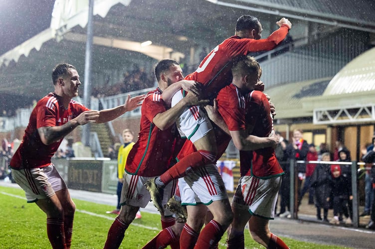 Llanelli, Wales - 19th March 2024: 
Sion Bradley of Cymru celebrates scoring his sides first goal from a free kick.
Cymru v England C in an International Friendly at Stebonheath Park on the 19th March 2024. (Pic by Lewis Mitchell/FAW)