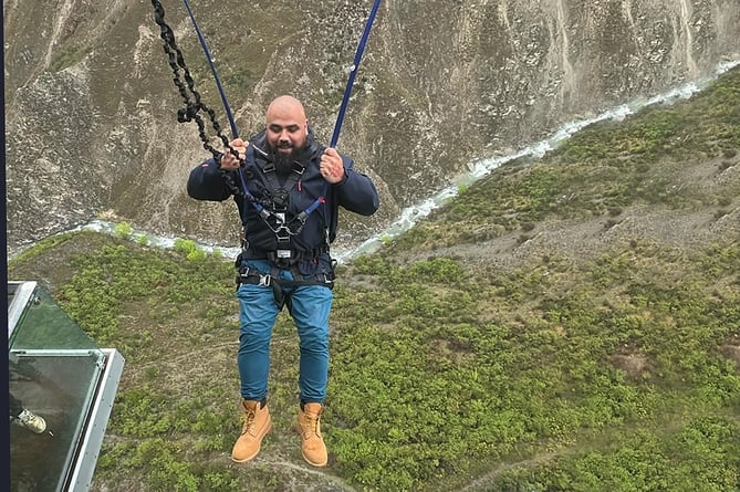 Fearless Chris “Flamebaster” Roberts takes flight on the world’s biggest swing. Photo: S4C