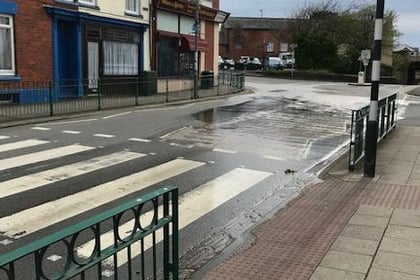 Water company comes under fire as high street leak continues