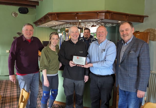 The pub has received a plaque from Pub is The Hub recognising its important role at the heart of its community. (Left to right: Alwyn Jones, committee member, Zoe Smith, publican, Huw Antur, committee secretary, Jonathan Smith, publican, Pub is The Hub regional advisor for Wales Malcolm Harrison, and Elfyn Llwyd, committee member