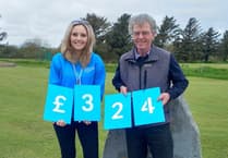 Pwllheli golf captain hands money to Parkinson's charity
