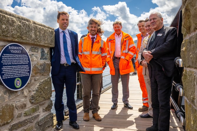 Lord Hendy, chair of Network Rail, joined Ken Skates MS, Mayor of Barmouth Owain Pritchard and members of the Network Rail project team to unveil the plaque. Photo: Network Rail