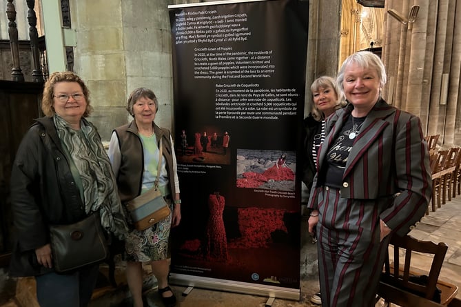 Amanda Baizley, Margaret Rees, Sarah Davidson, Catrin Jones with Gown of Poppies banner