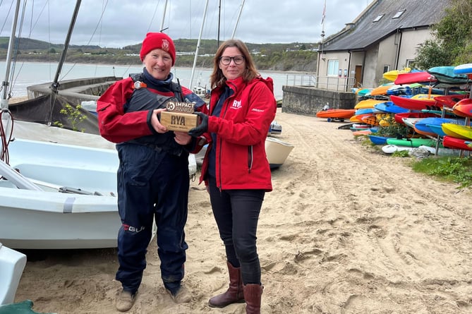 Hannah Schafer is presented an RYA Impact Award. Photo: Cardigan Bay Watersports