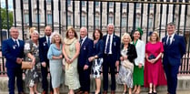 RNLI volunteers celebrate long service at Royal palace garden party