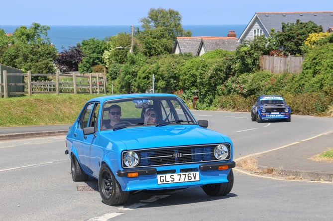 Osian Pryce with Hana Medi Morris led the convoy of cars through Aberporth