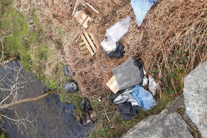 The rubbish Len Evans admitted dumping on the bank of Afon Dwyfach. Photo: Gwynedd Council