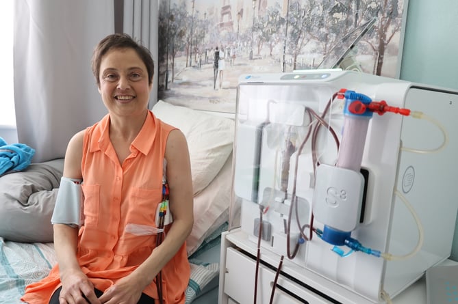 Ceri Granton dialysising at home after receiving a mobile dialysis unit that she can also take away on holiday with her