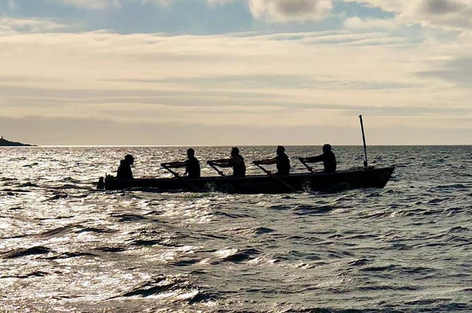  Aberdyfi Men's crew rowing across Cardigan Bay