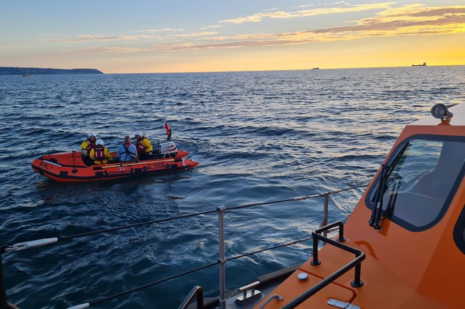 Inshore lifeboat with casaulty on board