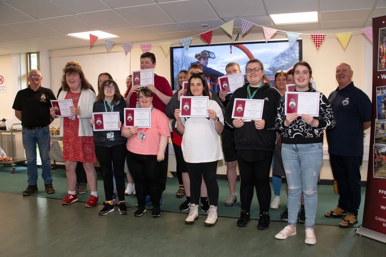 Glynllifon students receiving their certificates