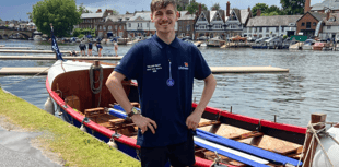 New Quay RNLI's youngest member takes part in Royal Regatta rowpast