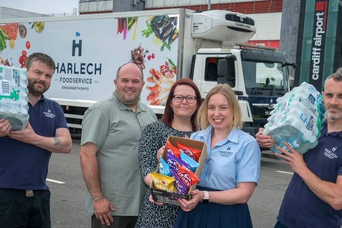 Harlech driver Nathan Ball, Chris Mason and Stacey Andrews, of Cardiff Airport, Laura Griffiths, Harlech Key Account Manager, and Harlech driver Huw Rowlands. Photo: Patrick Olner