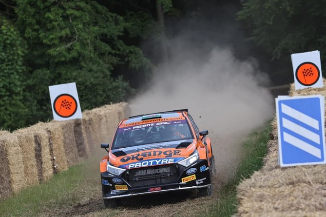 Williams in his Orange Amps-backed Hyundai i20 Rally2