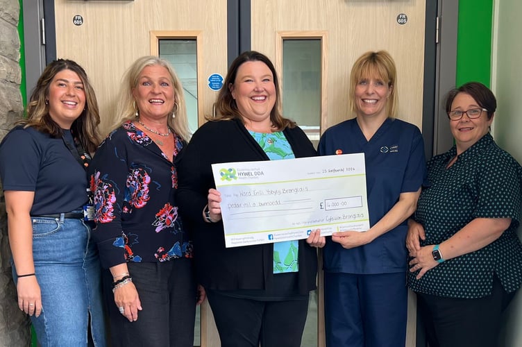 Paige Denyer, Hywel Dda Health Charities; Elinor Powell and Rhian Davies, Cyfeillion Bronglais League of Friends; Becky Pateman, Ward Manager; Ann Elias, Ward Clerk 