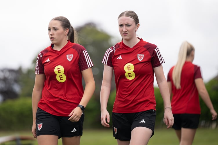 CARDIFF, WALES - 09 JULY 2024: Wales' Mared Griffiths and Wales' Cadi Rodgers during a training session at the Vale Resort in Cardiff on the 9th of July 2024. (Pic by Ashley Crowden/FAW)