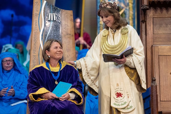 Eurgain Haf, who lives within a stone's throw of the Maes at Parc Ynysangharad in POntypridd was presented with the Prose Medal in a colourful ceremony led by Archdruid Mererid Hopwood.