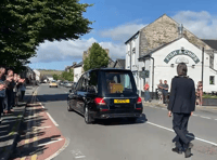 Machynlleth lines the street to bid farewell to Cllr Michael Williams