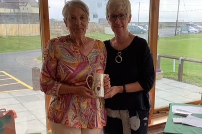 Barbara Reece receiving the runner up prize from Catrin