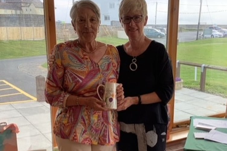 Barbara Reece receiving the runner up prize from Catrin