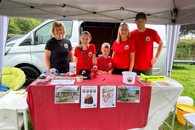 The family on the stand at Llanilar Show