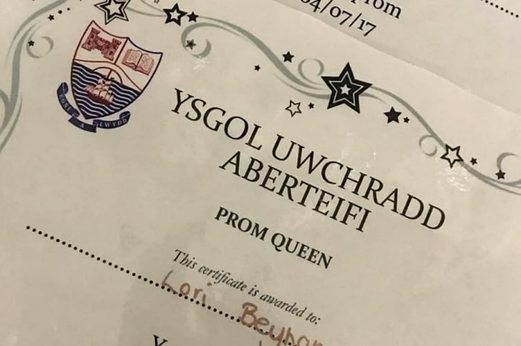 Transgender student Lori Beynon's Prom queen certificate. See SWNS story SWQUEEN; A teenager has told of the "best moment of her life" when she was crowned as the UK's first ever transgender school prom queen. Inspirational Lori Beynon, 16, was born Luis but started transitioning two years ago after confessing her true identity to her mum in a text message. The bubbly fashion lover now wears a skirt to secondary school and is set to start hormone treatment in the coming months. But the glamorous teen was astonished when her classmates at Cardigan Secondary School voted her to be this year's Prom Queen at their end of 