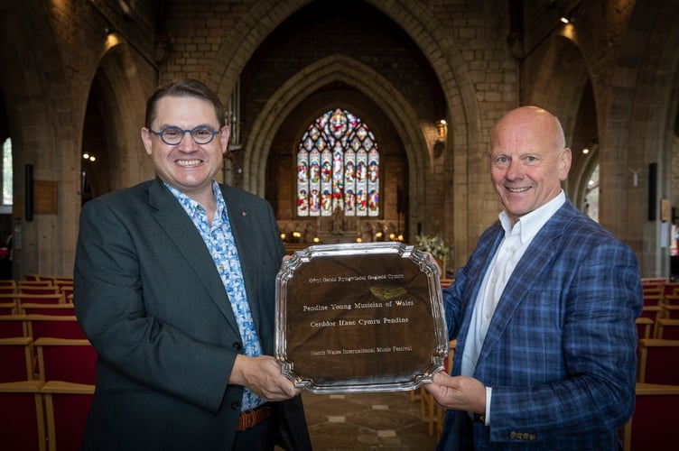 Paul Mealor, Artistic Director of the North Wales International Festival and Mario Kreft MBE, proprietor of Pendine Park with the Pendine young musician of Wales trophy.                               Picture Mandy Jones