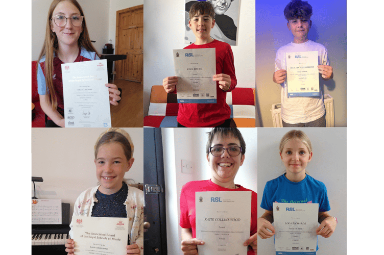 Some of the Totaleigh Music students with their exam certificates