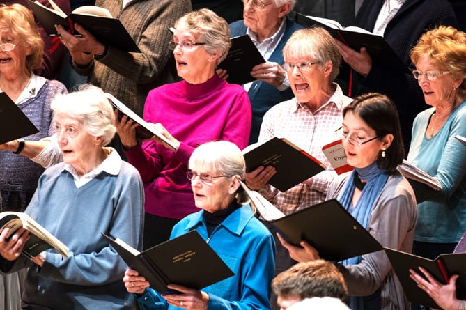 Town and gown (locals and students) take part in the choir