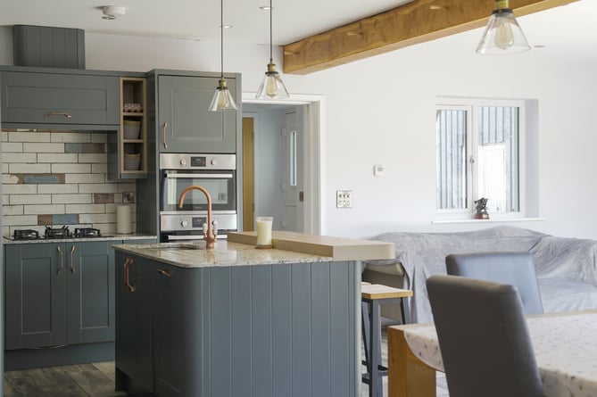 The heart of the home is the fantastic kitchen, with a central island unit with a double bowl sink unit.