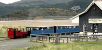 Fairbourne railway and Barmouth Bridge train crossing in one image