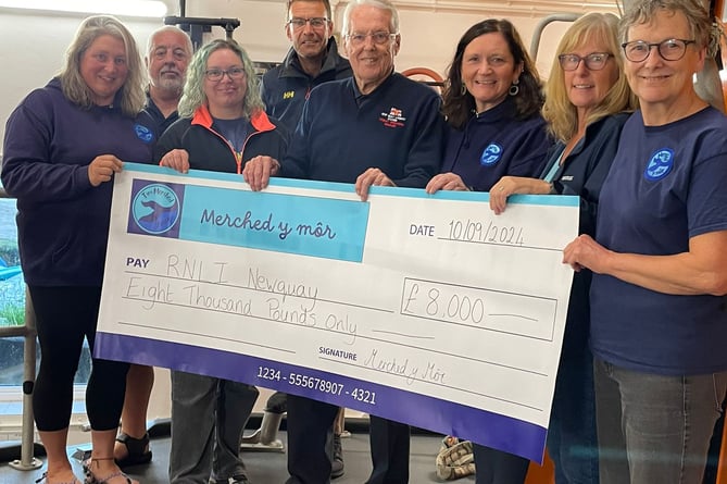 Merched Y mor with New Quay RNLI (L-R Ali, Ken, Kate, Huw, Roger, Sian, Sally, Jill)