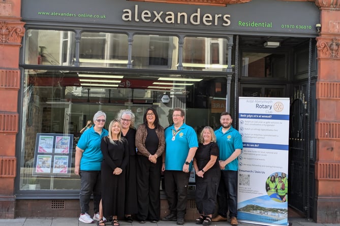 Layla Ross and President Martin Tranter (centre) with Alexanders staff and Ardal Aberystwyth Rotarians