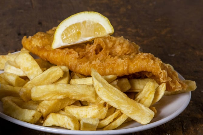 FILE PHOTO Fish and chips. See SWNS story SWLEcod; A pub grub classic could soon be cast off the menu after fish and chips tripled in price since the start of the year - and is now more expensive than fillet steak. Landlord Alex Cook, 40 says the cost of the pub stable has taken a battering since the Russian invasion of Ukraine and fears boozers will no longer be able to afford to sell it. He has even encouraged hungry customers to visit the local chippy instead if they want fish and chips, which is Brits' second favourite pub meal after a Sunday roast. Alex, who owns three pubs in North Yorkshire, said rising wholesale costs meant the traditional cod meal was now 'unsustainable' for most British boozers.