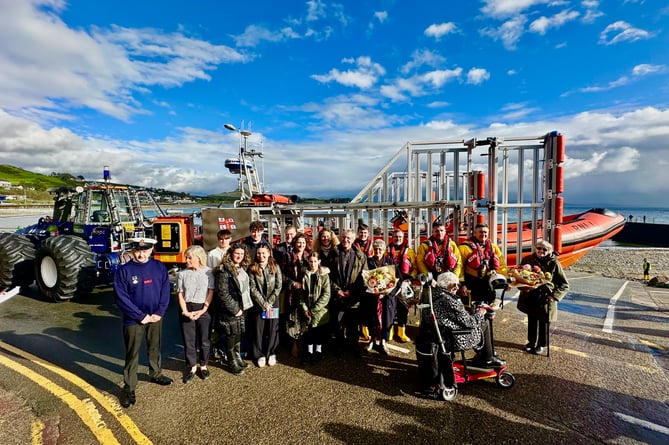 The Townley family with representatives from Criccieth Lifeboat Station and the RNLI