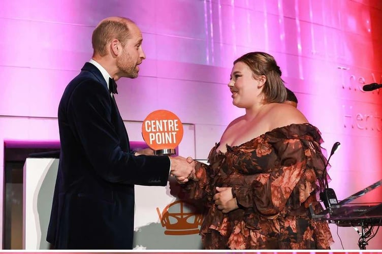 Anya received her award from Prince William