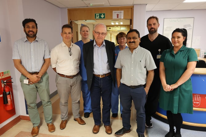 Mr Alun Roberts with members of the Orthopaedic surgical, therapies and outpatient team at Ysbyty Gwynedd