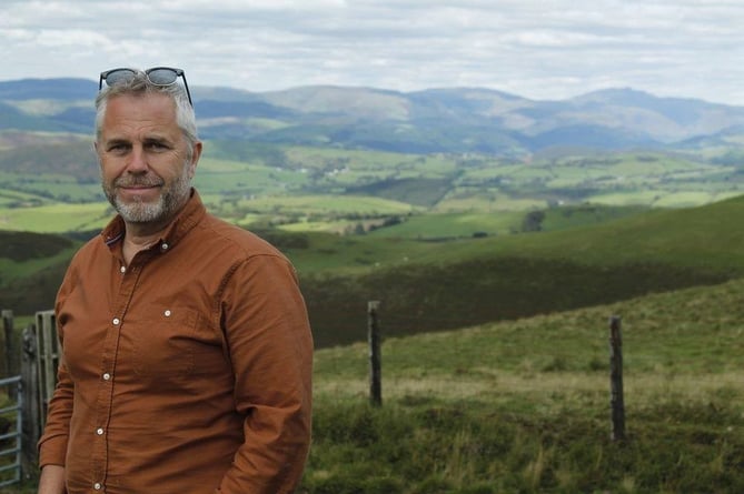 Plaid Cymru group leader, Cllr Elwyn Vaughan, who is proposing the motion to devolve management of the Crown Estate to the Welsh Government.