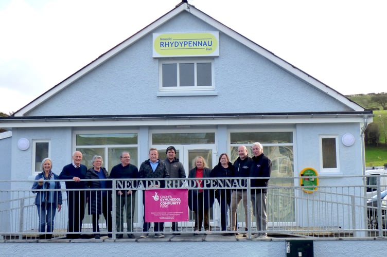 Outside the newly painted and improved frontage showing bespoke railings and overhead signage are, from left to right, Ceri Jones, Vaughan Griffiths, Lila Piette, Arwel George, Dave Reed, Owen Evans, Annette Keyworth, Rachel Richards, Rhys Lewis and Guy Jones