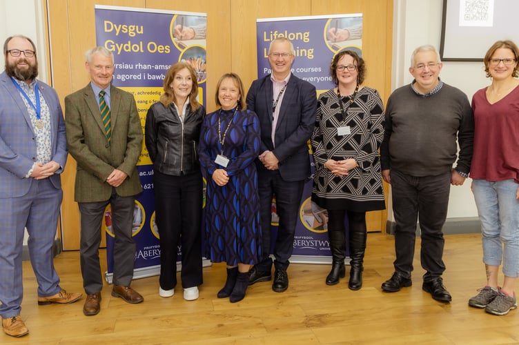 Cllrs Emlyn Jones and Wyn Thomas, Professor Mererid Hopwood, Professor Anwen Jones, Vice-Chancellor Professor Jon Timmis, Elin Mair Mabbutt, Antonio Barriga Rubio and Dr Helen Marshall