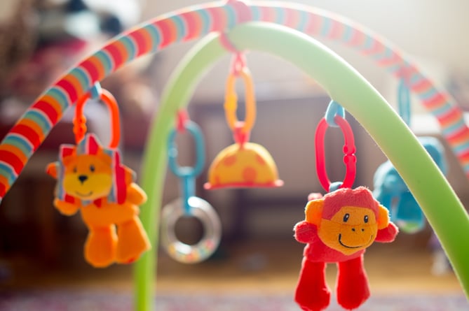 File photo dated 24/01/16 of soft toys on a baby activity mat. More than a quarter of parents have struggled to provide enough food for their children in the past year amid the cost-of-living crisis, a charity has warned. Barnardo's Scotland said that too many children are missing out on a "good childhood" as parents struggle to put hot meals on the table and heat their home. Issue date: Wednesday September 11, 2024.