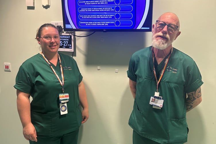 Staff from Withybush A&E with one of the TVs