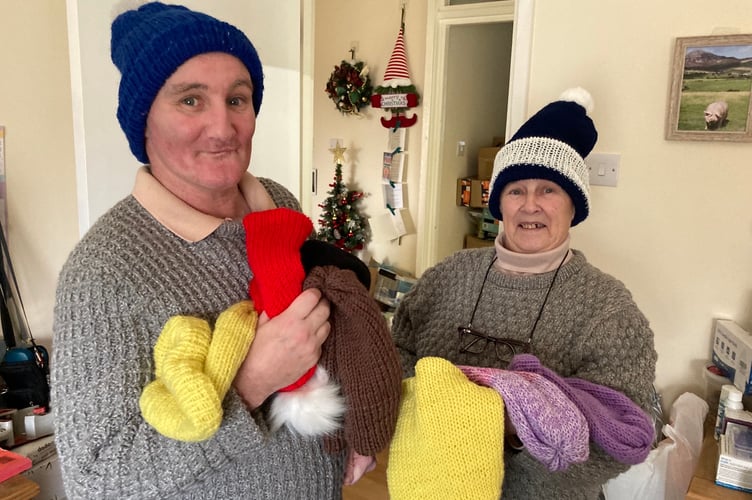 Stephen and Pauline with some of their hats