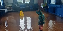 Road closure and hall flooded after heavy rainfall on new year's day