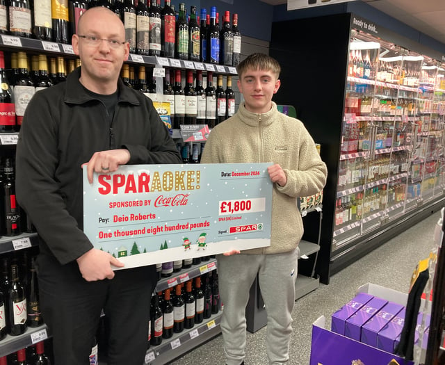 Spar-aoke star scoops cash prize for belting out Christmas classic