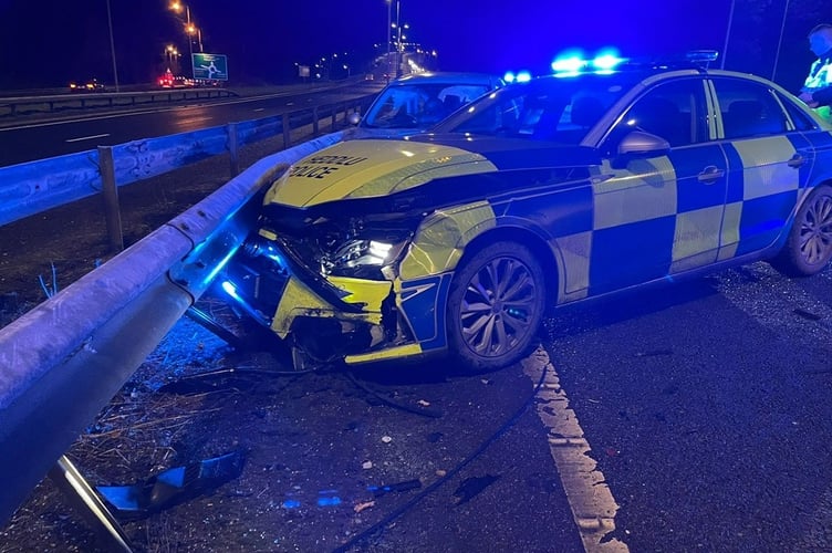 North Wales Police picture of the damaged patrol car