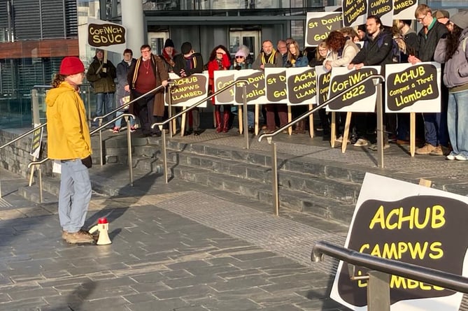 Lampeter student Jaime Fitter addresses campaigners outside the Senedd