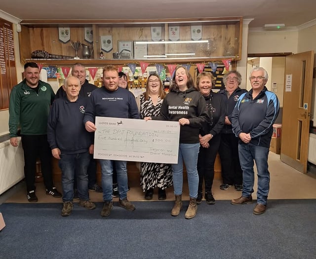 Tregaron motor club presents cheques to two charities