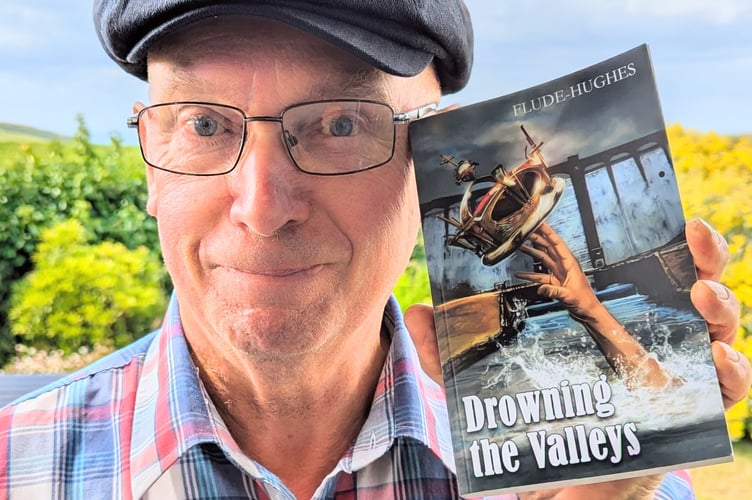 Paul Flude with a copy of ‘Drowning the Valleys’